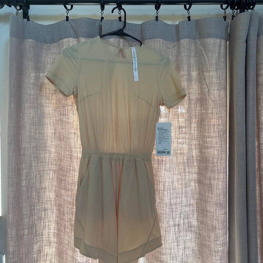 Cream romper with adjustable waistband